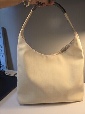 Gucci-  Tom Ford-era cream canvas hobo bag featuring Authentic Vintage